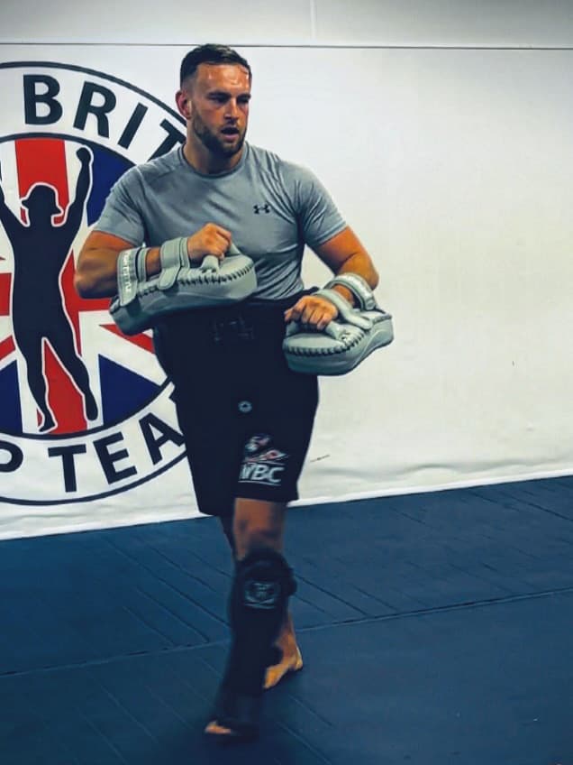 Hayden set up on the pads in front of a Great Britain team backdrop
